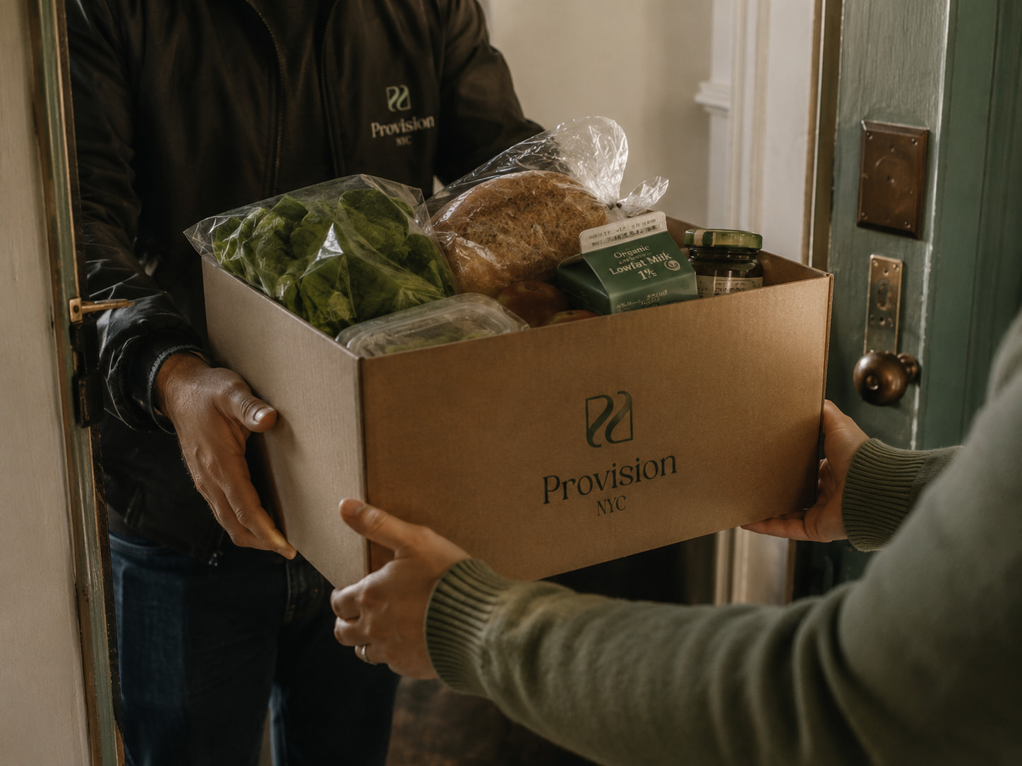 A grocery delivery arriving at an apartment door